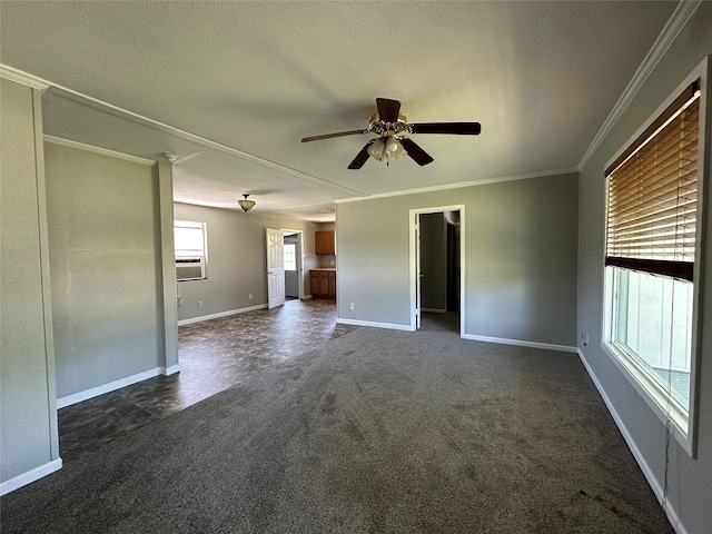 unfurnished living room with dark colored carpet, cooling unit, ceiling fan, ornamental molding, and a textured ceiling