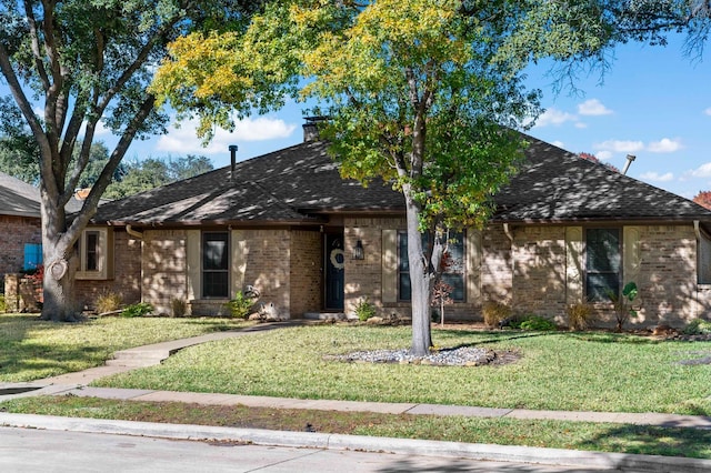 view of front of property with a front lawn