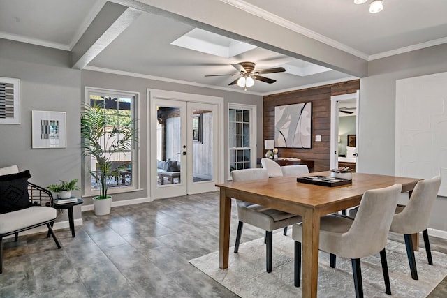 dining room featuring ceiling fan, french doors, and crown molding