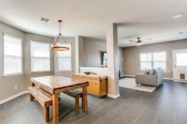 dining area with ceiling fan