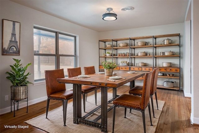 dining room featuring hardwood / wood-style floors