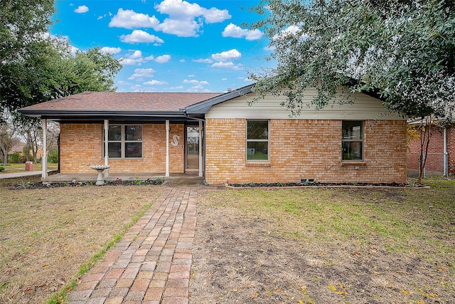 ranch-style home with a front yard