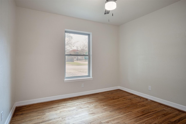 spare room with light hardwood / wood-style flooring