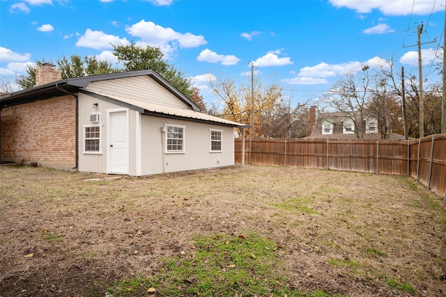 exterior space featuring a yard