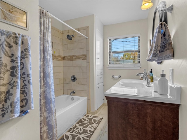 bathroom featuring vanity, tile patterned floors, and shower / bath combo with shower curtain