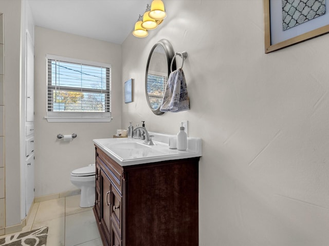 bathroom with tile patterned floors, toilet, and vanity