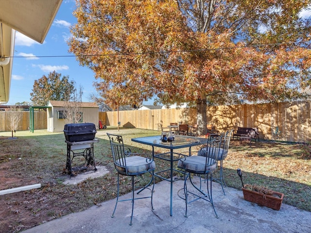 view of patio / terrace featuring an outbuilding