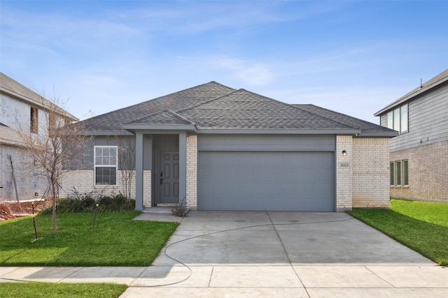 single story home with a front lawn and a garage