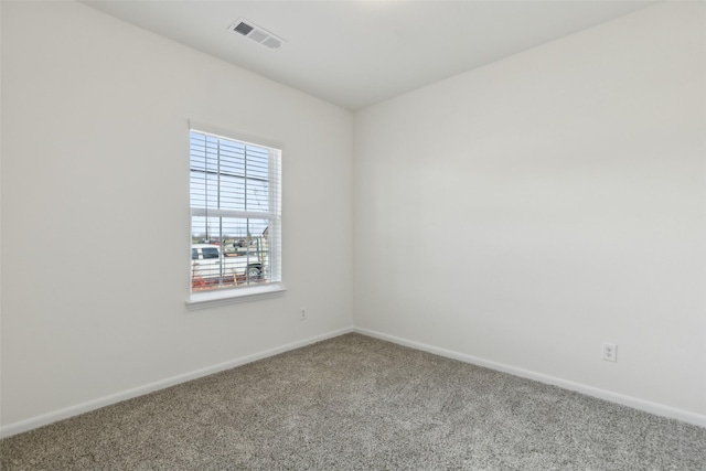 view of carpeted spare room