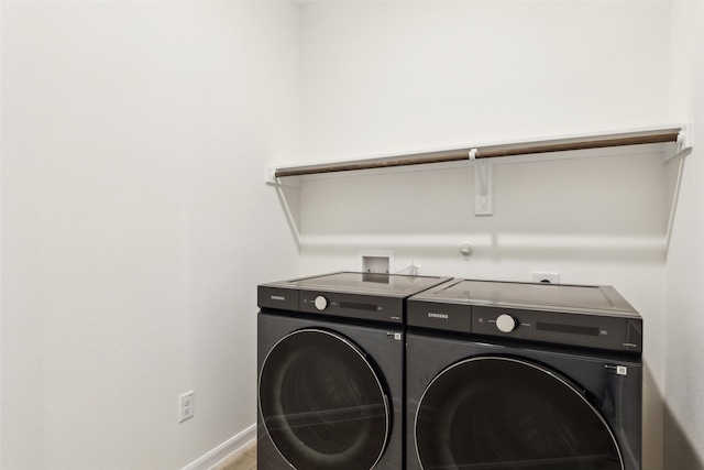 laundry room with separate washer and dryer