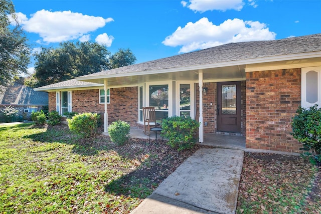 view of front of property featuring covered porch