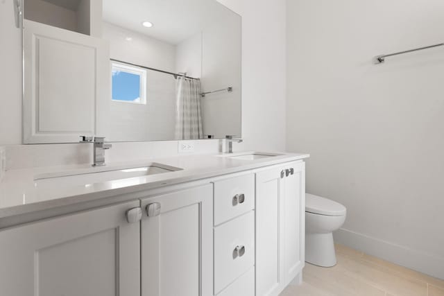 bathroom featuring vanity, hardwood / wood-style floors, toilet, and walk in shower