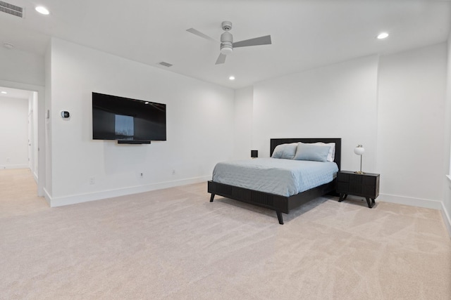 bedroom with light carpet and ceiling fan