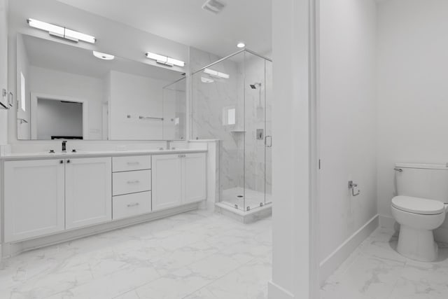 bathroom featuring walk in shower, vanity, and toilet