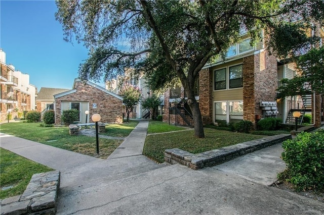 view of community featuring a yard