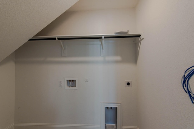 clothes washing area featuring hookup for a gas dryer, electric dryer hookup, and washer hookup