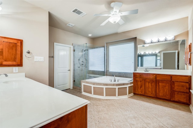 bathroom with ceiling fan, vanity, tile patterned floors, and independent shower and bath