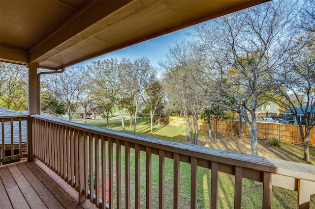 wooden deck with a yard