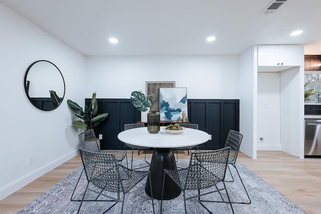 dining room featuring light hardwood / wood-style floors