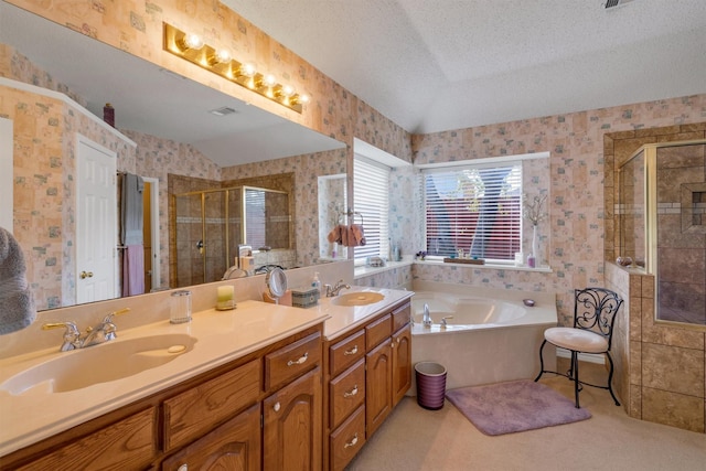 bathroom featuring plus walk in shower, vanity, a textured ceiling, and vaulted ceiling