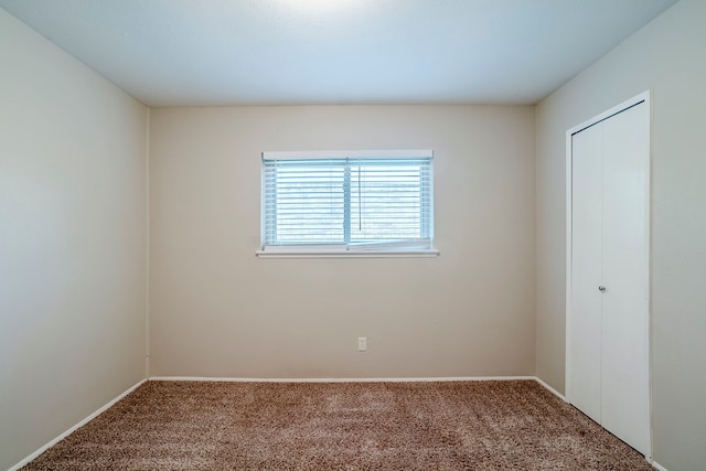 empty room with carpet floors