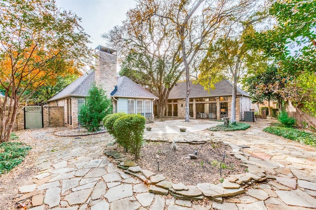 rear view of property with a patio