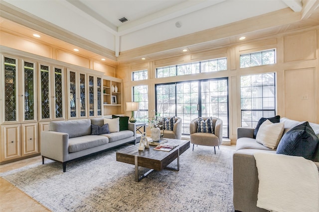 living room featuring a high ceiling