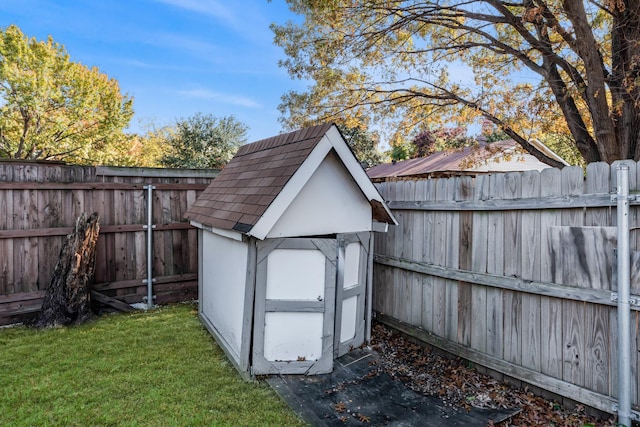 view of shed featuring a fenced backyard