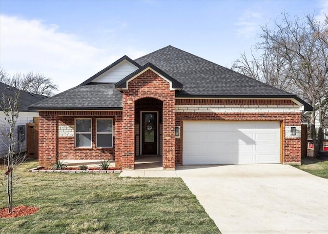 view of front of house with a front lawn and a garage