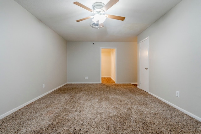 carpeted empty room with ceiling fan