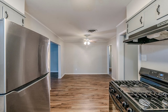 kitchen featuring white cabinets, light hardwood / wood-style flooring, ceiling fan, black gas range oven, and stainless steel refrigerator