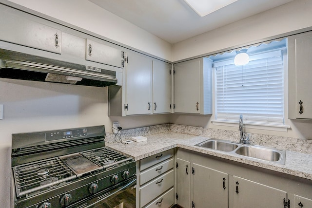 kitchen featuring sink and black range with gas cooktop