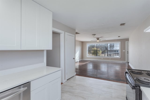 kitchen with ceiling fan, dishwasher, black electric range, light hardwood / wood-style floors, and white cabinets