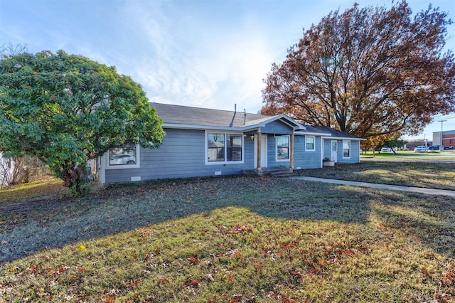 single story home featuring a front yard