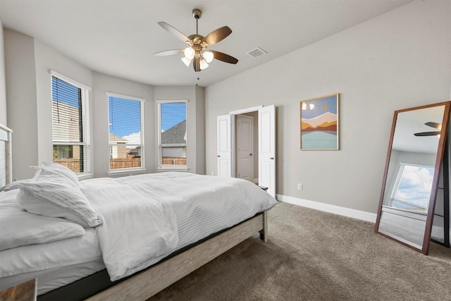 bedroom with ceiling fan and carpet flooring