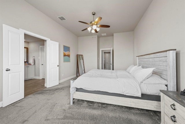 carpeted bedroom with ceiling fan