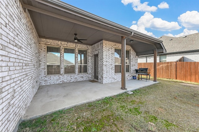 view of patio / terrace featuring ceiling fan and grilling area