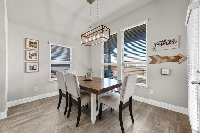 kitchen featuring appliances with stainless steel finishes, a center island with sink, white cabinetry, and sink