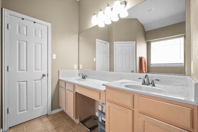 bathroom featuring vanity and tile patterned flooring