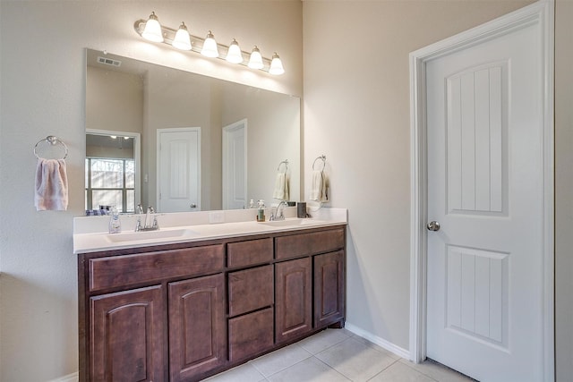 221 Gardenia Dr, Azle, TX 76020 - full bath with tile patterned flooring, double vanity, and baseboards