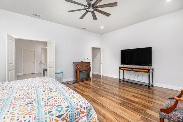 bedroom featuring ceiling fan and wood-type flooring