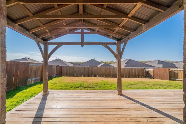 deck with a gazebo and a yard