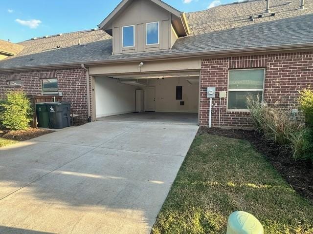 view of front of property with a garage