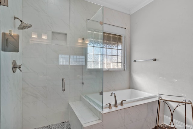 bathroom with separate shower and tub and ornamental molding