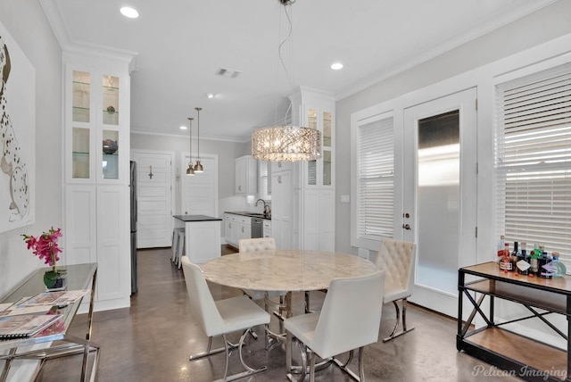 dining room featuring ornamental molding