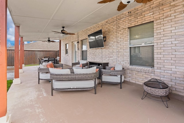 view of patio / terrace with ceiling fan, outdoor dining space, outdoor lounge area, and fence