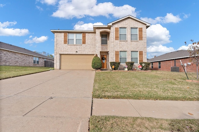 traditional home with a garage, central AC, brick siding, driveway, and a front yard