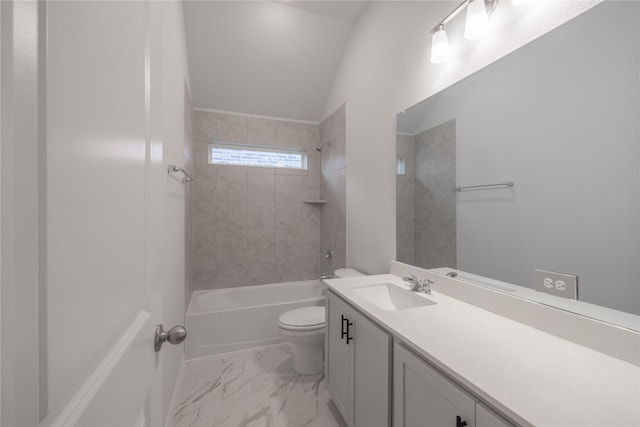 full bathroom with vanity, toilet, tiled shower / bath, and lofted ceiling