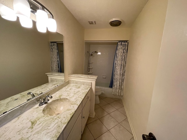 full bathroom with shower / tub combo, vanity, a textured ceiling, tile patterned flooring, and toilet