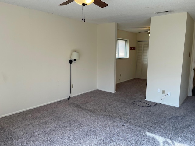 spare room featuring carpet flooring